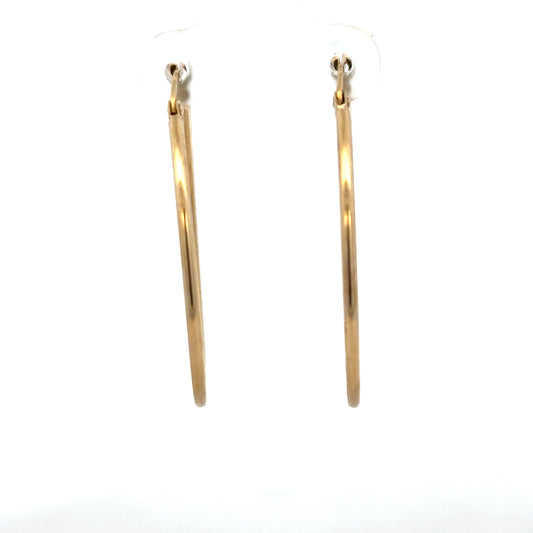 9ct yellow gold hoop earrings with a sleek, classic design, weighing 1.1g, suitable for everyday wear.