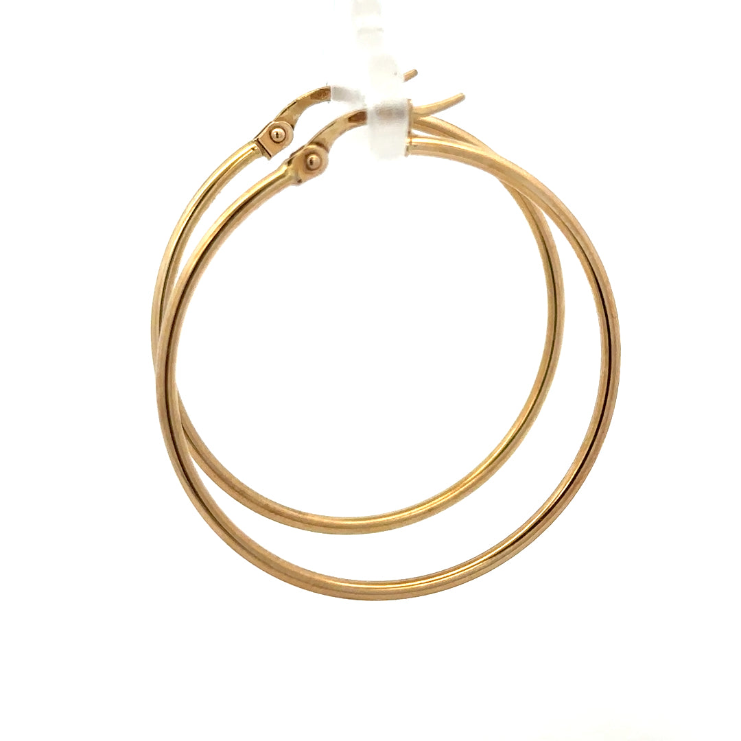 9ct yellow gold hoop earrings, unbranded, with a sleek circular design and 1.1g weight, displayed on a white background.