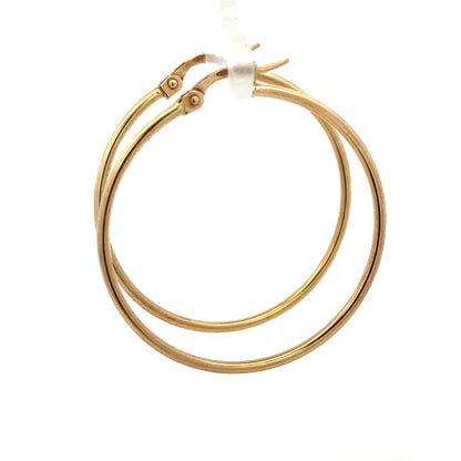 9ct yellow gold hoop earrings, unbranded, with a sleek circular design and 1.1g weight, displayed on a white background.