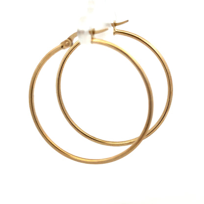 9ct yellow gold hoop earrings, unbranded, lightweight 1.1g, classic round design, shown in close-up view.