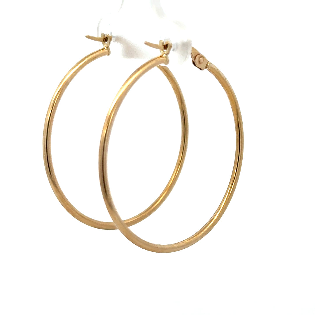 9ct yellow gold hoop earrings weighing 1.1g, unbranded jewelry with classic circular design, suitable for everyday wear