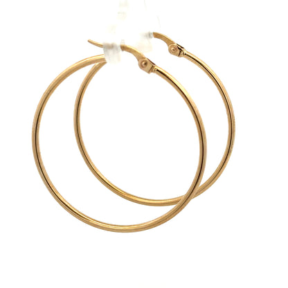 9ct yellow gold hoop earrings with a sleek circular design, lightweight at 1.1g, unbranded jewelry accessory for pierced ears.