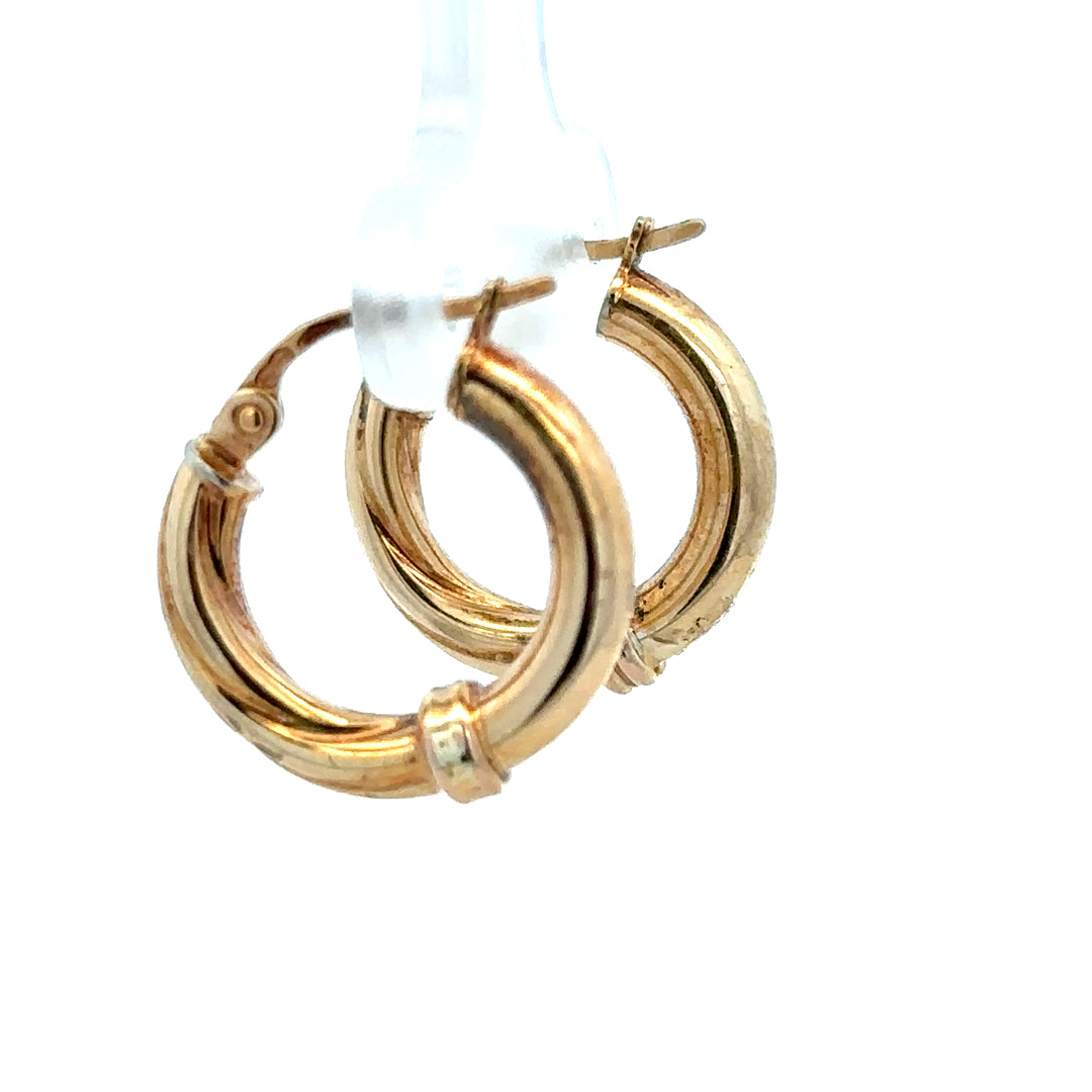 9ct yellow gold hoop earrings with a sleek, classic design, weighing approximately 1.5 grams.