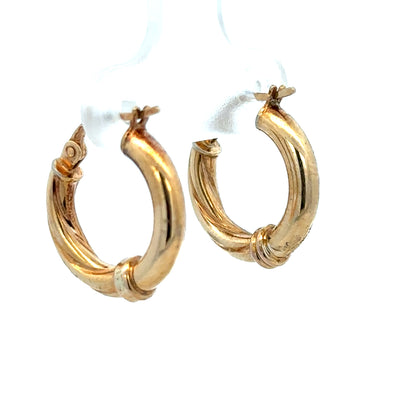 9ct yellow gold hoop earrings, lightweight 1.5g, unbranded, featuring classic circular design, shown on a plain background.