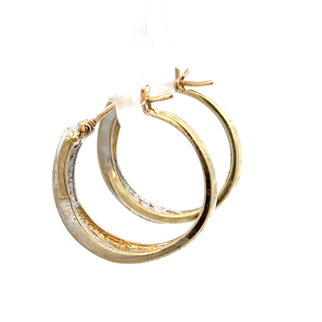 9ct yellow gold hoop earrings weighing 3.5g, unbranded, with a classic circular design, shown close-up against a neutral background.