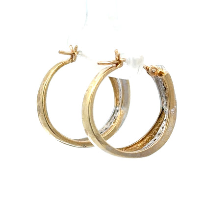 9ct yellow gold hoop earrings weighing 3.5g, unbranded, with a classic circular design and polished finish.