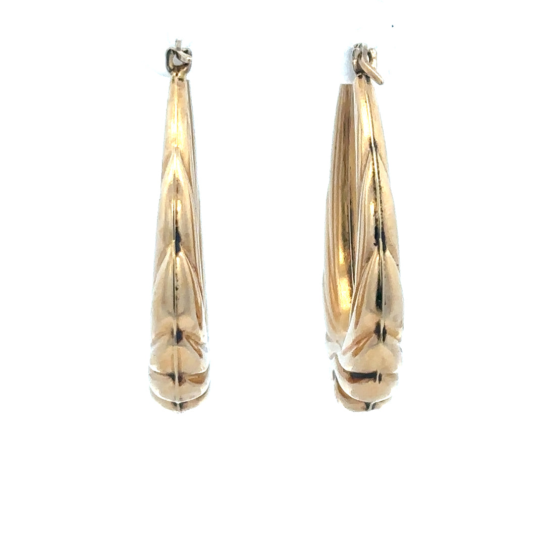 9ct yellow gold hoop earrings with a 3.8g weight, featuring a classic circular design, ideal for everyday wear.