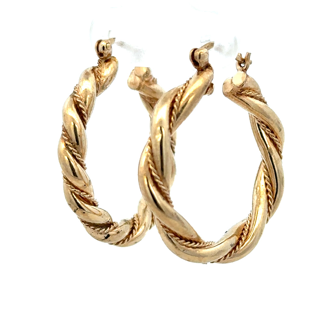 9ct yellow gold hoop earrings, unbranded, 4.9g, classic circular design, shining polished finish, shown on a white background.
