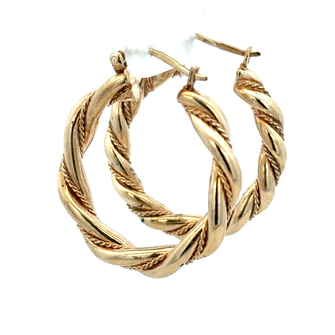 9ct yellow gold hoop earrings weighing 4.9g, unbranded, featuring classic circular design and polished finish.