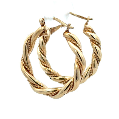 9ct yellow gold hoop earrings weighing 4.9g, unbranded, featuring classic circular design and polished finish.