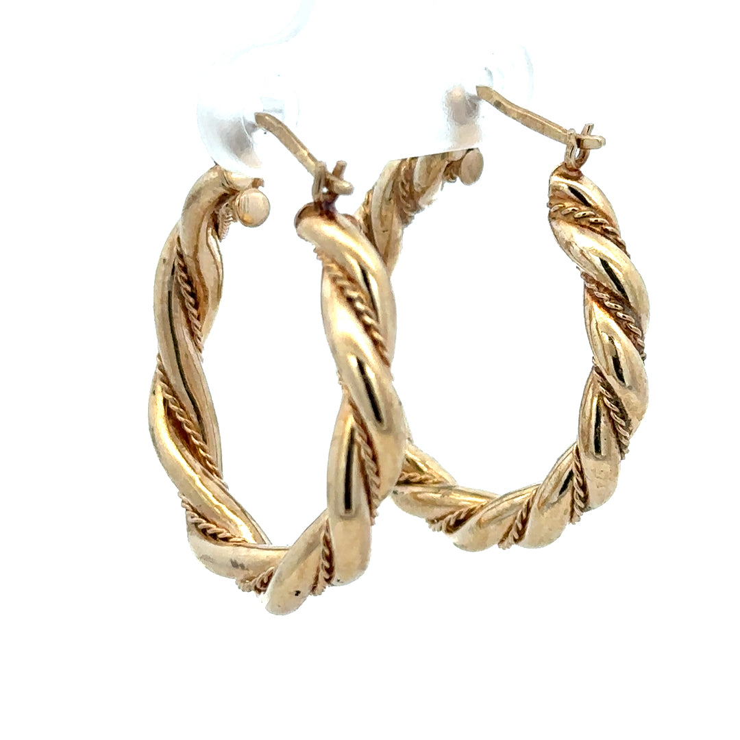 9ct yellow gold hoop earrings weighing 4.9g, shown in a close-up image highlighting their shiny, classic hoop design.