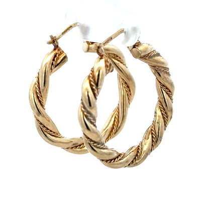 9ct yellow gold hoop earrings weighing 4.9g, featuring a classic round design, unbranded jewelry with polished finish.