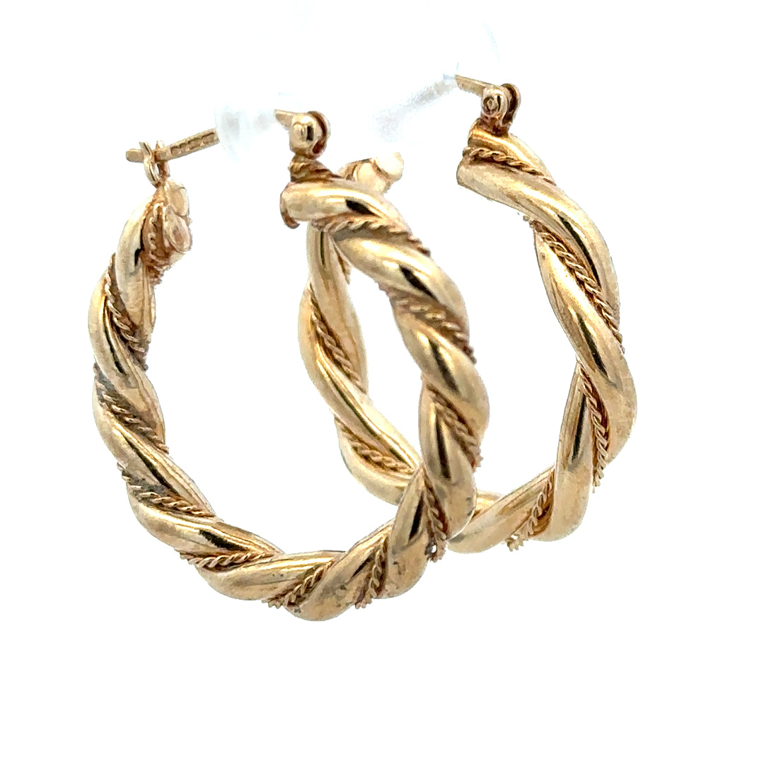 9ct yellow gold hoop earrings weighing 4.9g, unbranded, showcasing classic round hoop design with a polished finish.