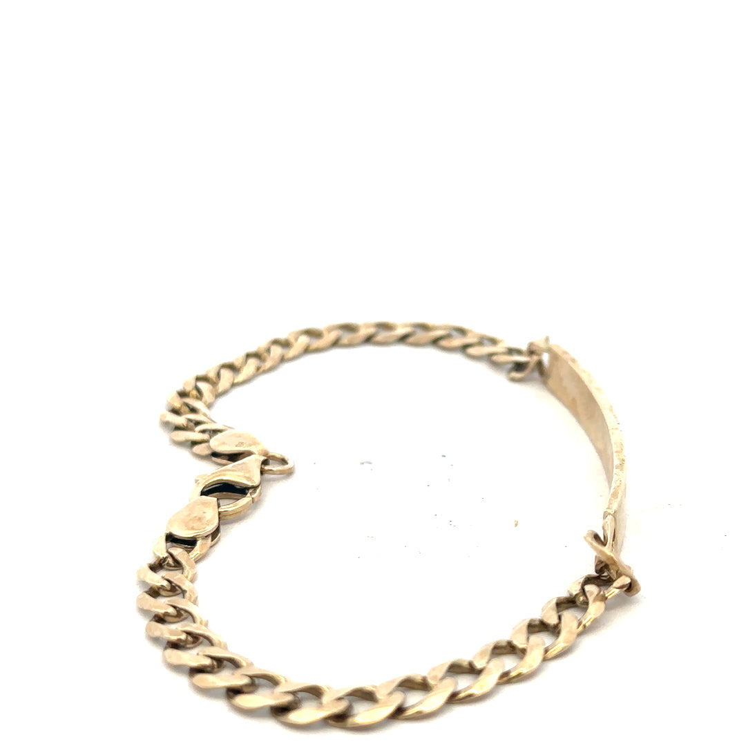 9ct yellow gold ID bracelet with a sleek design, showcasing polished gold and a secure clasp, weighing 11.6 grams.