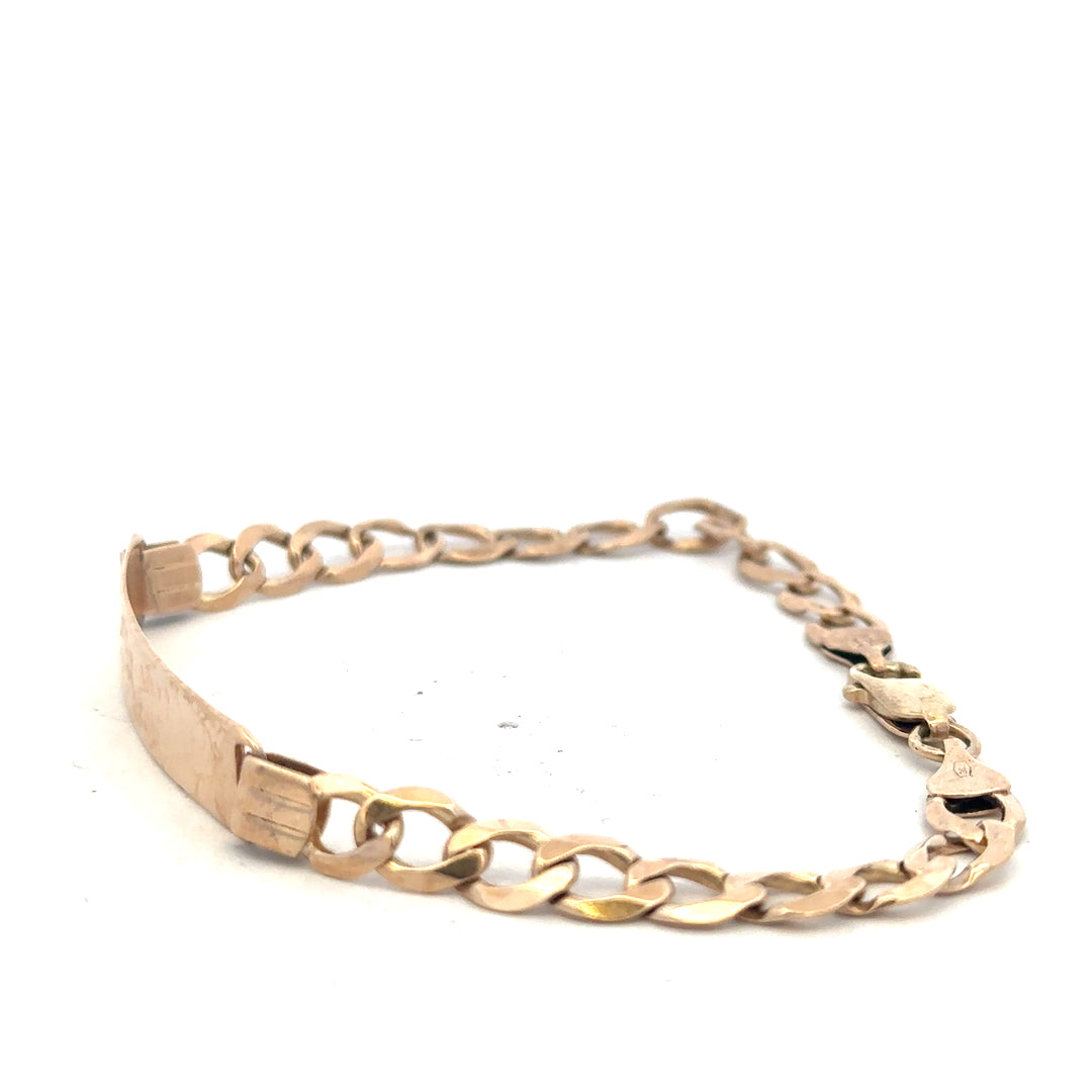 9ct yellow gold ID bracelet with a sleek, polished finish, weighing 9.7 grams, featuring a classic design and unbranded style