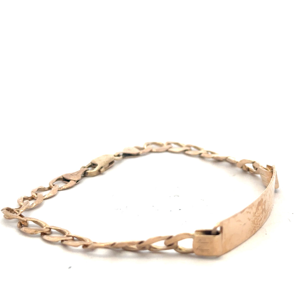 9ct yellow gold ID bracelet weighing 9.7g, unbranded, with a sleek, polished design and adjustable chain.