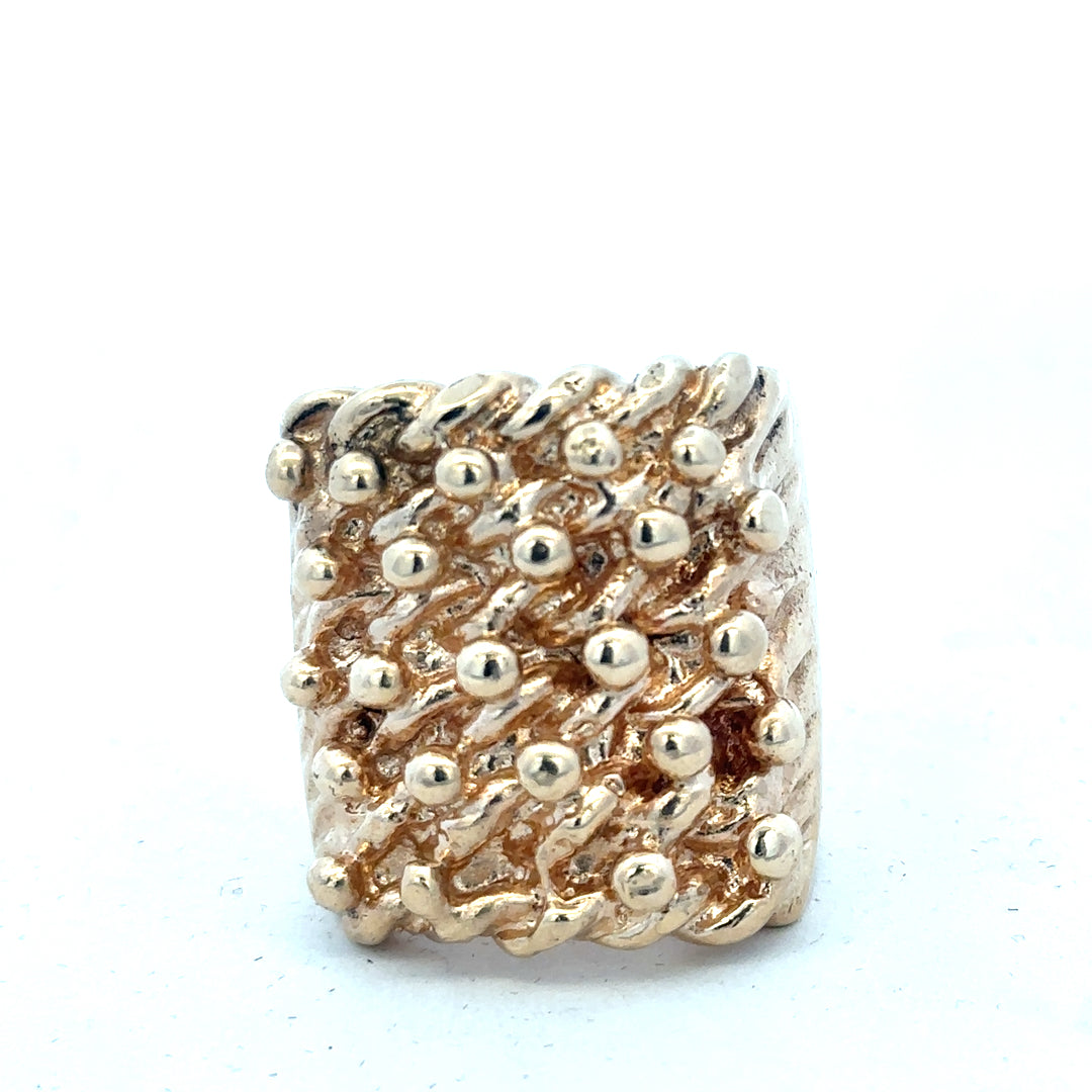 9ct yellow gold keeper ring, unbranded, showcasing a polished gold band with a secure clasp, weight 61.1 grams.