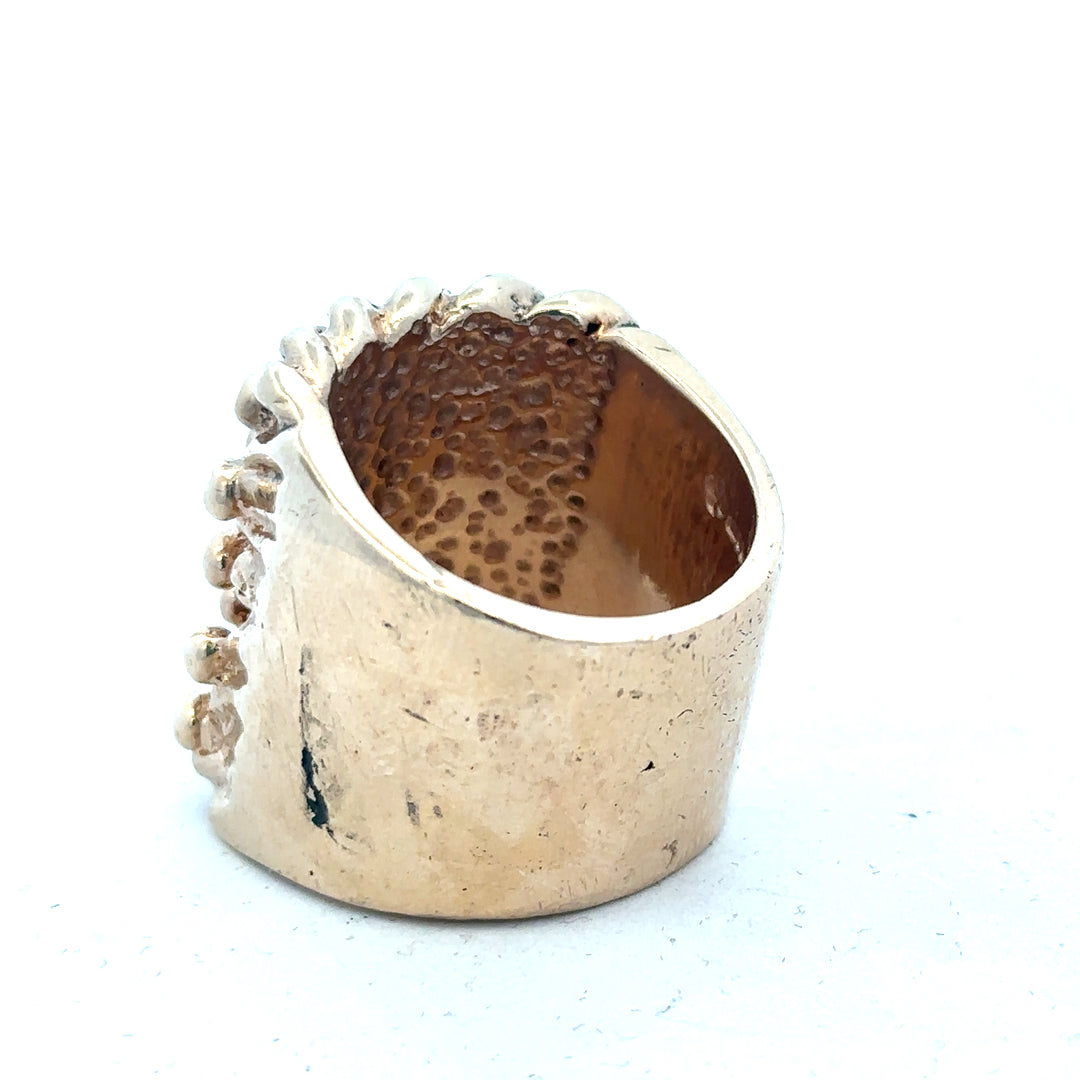 9ct yellow gold keeper ring, unbranded, showcasing a polished band with a secure clasp, weight 61.1 grams.