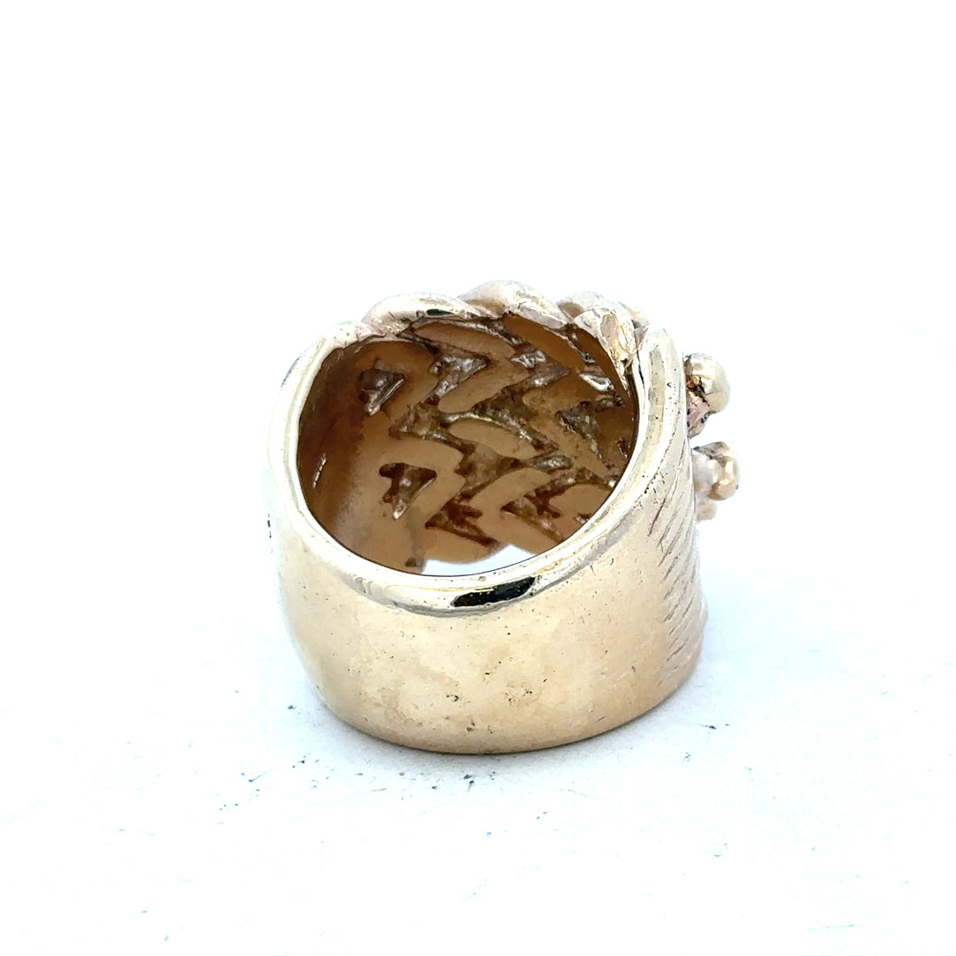 9ct yellow gold keeper ring in size W, close-up view showing smooth band and secure setting, unbranded jewelry accessory.
