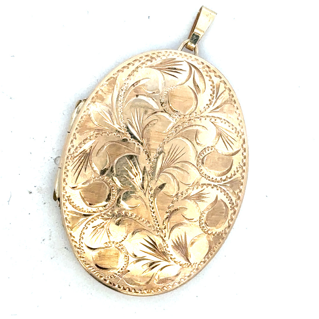 9ct yellow gold locket pendant with a polished finish, designed as a classic jewelry accessory.