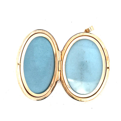 9ct yellow gold locket pendant with intricate design, weighing 13.8g, unbranded jewelry accessory for women.