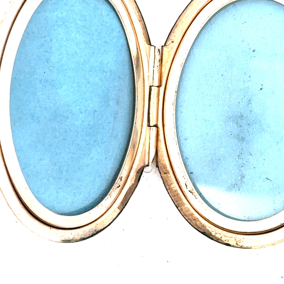 9ct yellow gold locket pendant with a smooth, polished surface, weighing 13.8 grams, unbranded jewelry accessory.