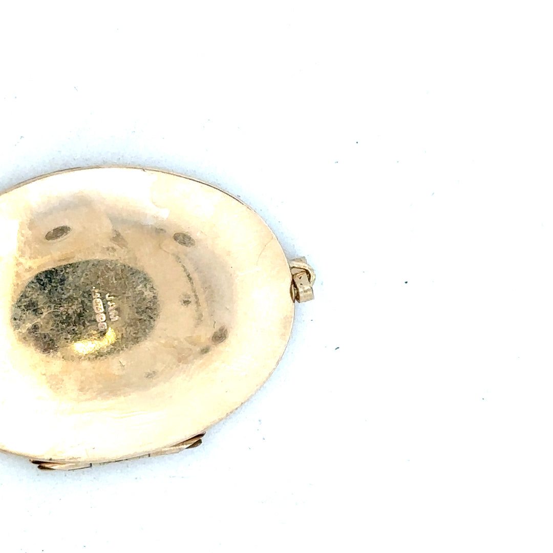 9ct yellow gold locket pendant with intricate design, weighs 13.8g, crafted for vintage-inspired jewelry collections.