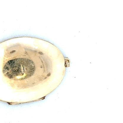 9ct yellow gold locket pendant with intricate design, weighs 13.8g, crafted for vintage-inspired jewelry collections.