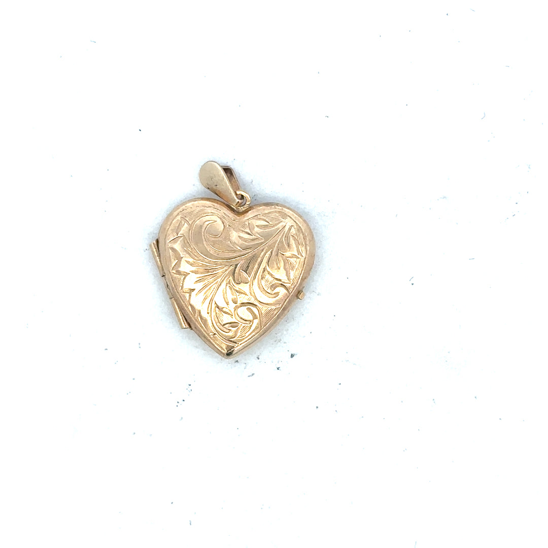 9ct yellow gold locket pendant, unbranded, with intricate design, weighing 2.5g, shown in close-up on a plain background.