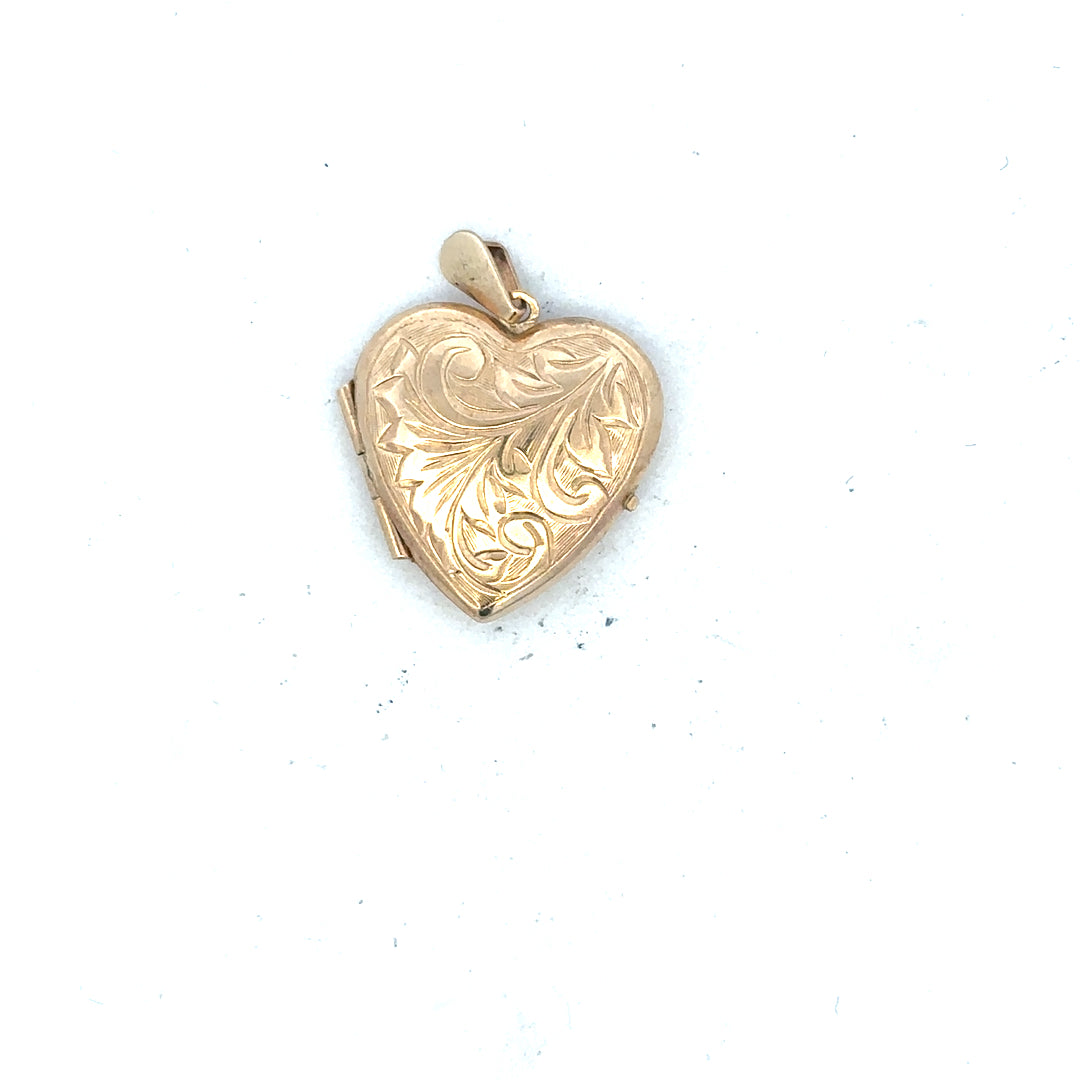 9ct yellow gold locket pendant, unbranded, weighing 2.5g, with intricate design visible in the image.