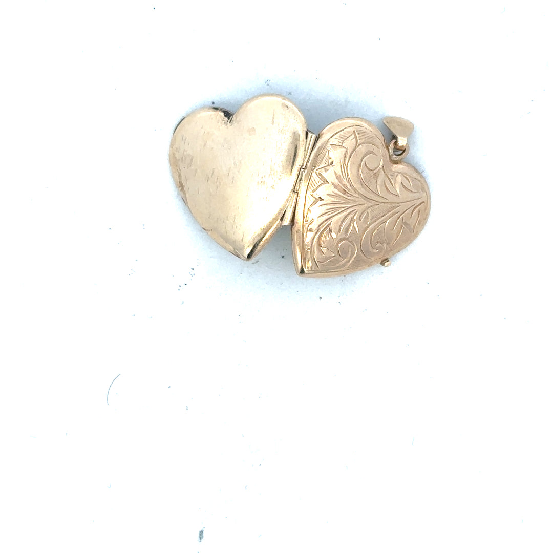 9ct yellow gold locket pendant, unbranded, weighing 2.5g, featuring a classic design in the product image.