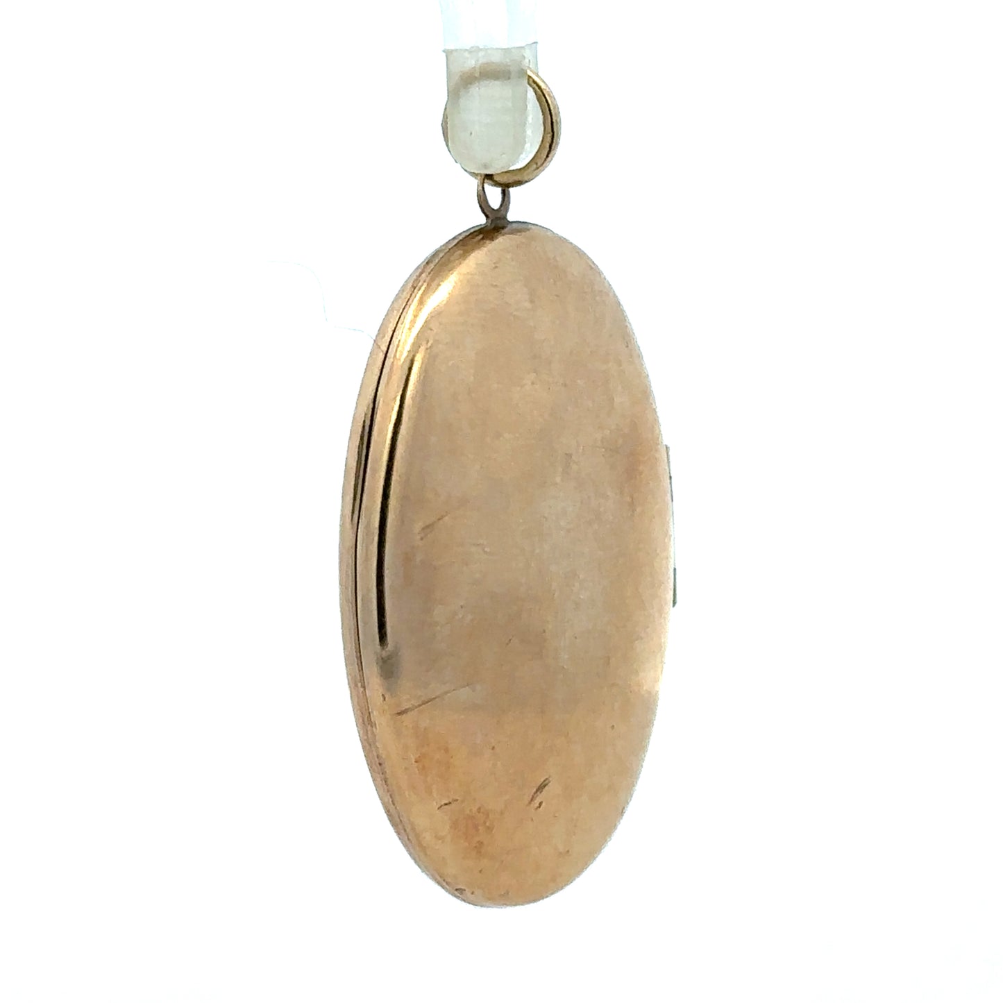 9ct yellow gold locket pendant, unbranded, with a 5.8g weight, featuring a classic design with a polished finish.