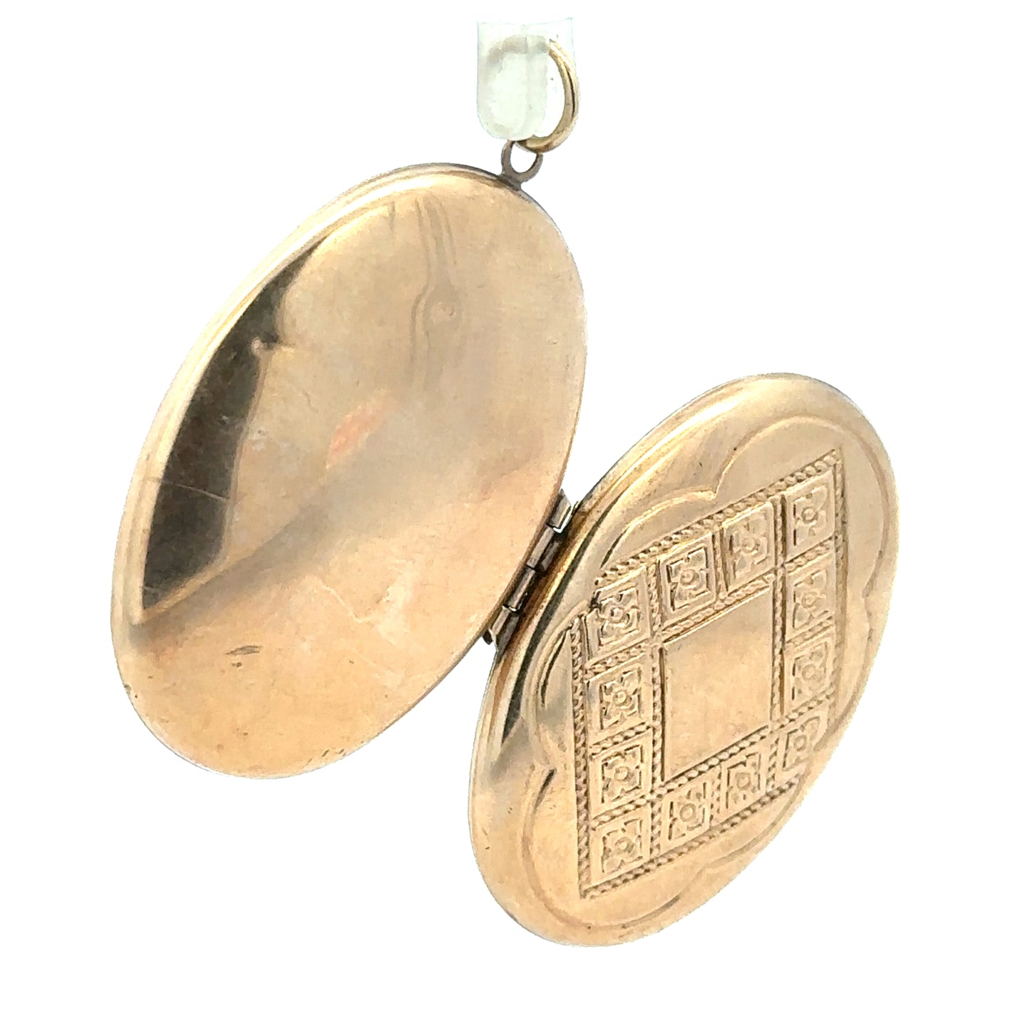 9ct yellow gold locket pendant showcasing a polished, unbranded design with a secure clasp, weighing 5.8g.
