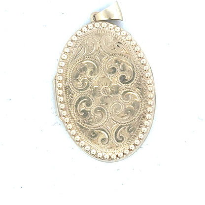 9ct yellow gold locket pendant with a polished finish, weighs 6.3g, designed for women, unbranded jewelry accessory.