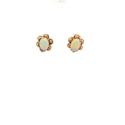 9ct yellow gold opal earrings with vibrant opal stones set in gold, weighing 2.1g, unbranded jewelry.