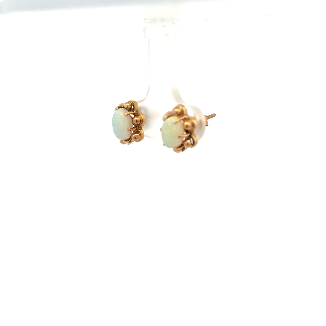9ct yellow gold opal earrings with vibrant gemstone accents, lightweight jewelry, unbranded, weighing 2.1g.