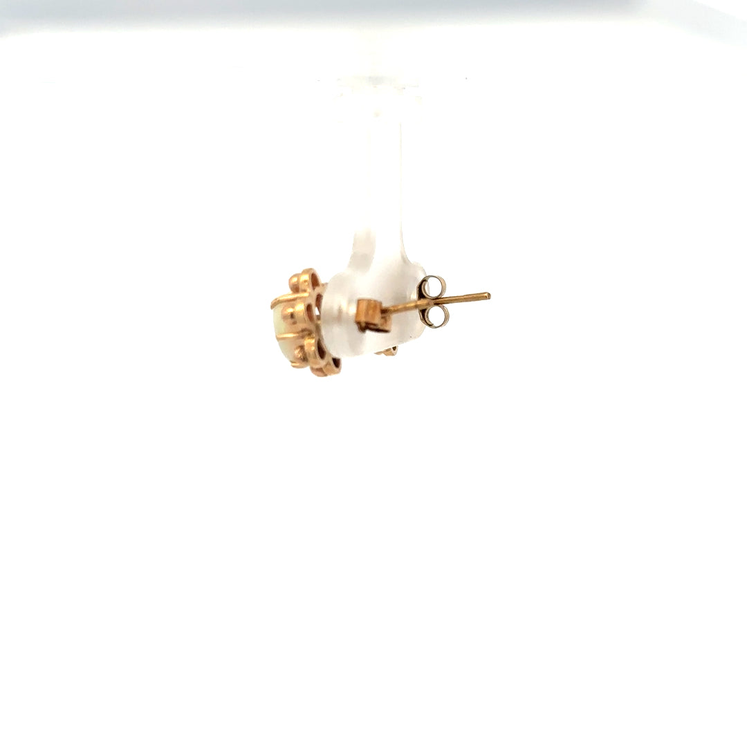 9ct yellow gold opal earrings featuring vibrant opal stones set in elegant gold, weighing 2.1g, unbranded jewelry.