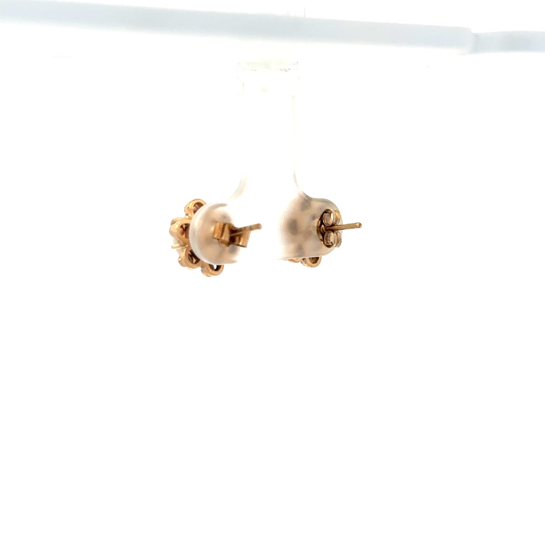 9ct yellow gold opal earrings featuring vibrant opal stones set in delicate gold, weighing 2.1 grams.