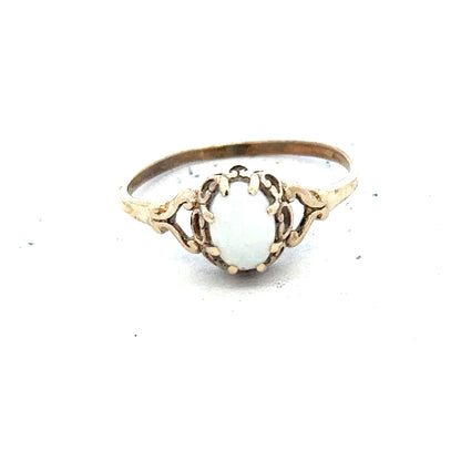 9ct yellow gold opal ring with a vibrant oval opal gemstone, size P, unbranded jewelry.