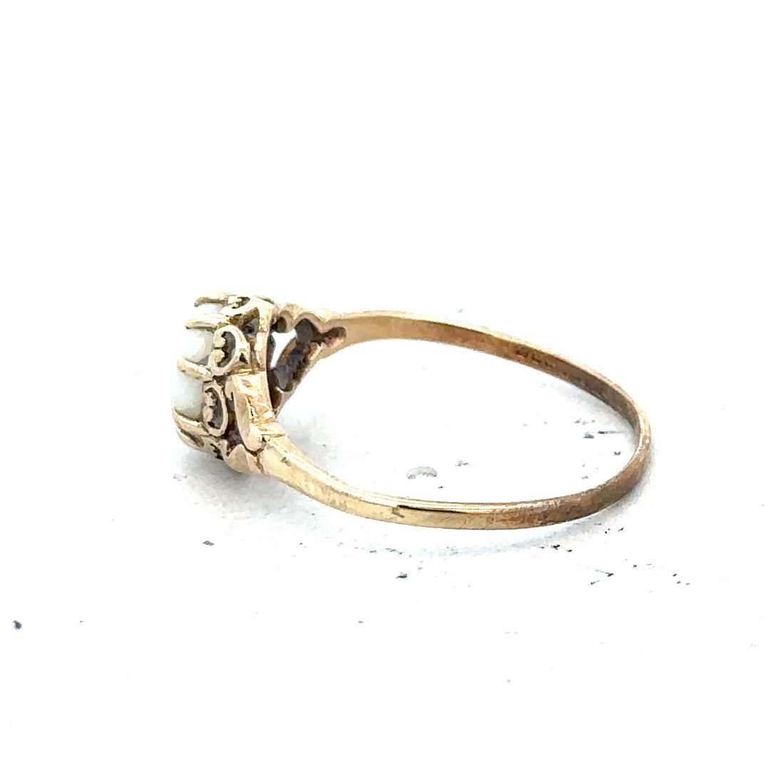 9ct yellow gold opal ring in size P with a vibrant opal gemstone and gold band, unbranded jewelry.