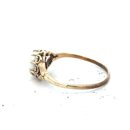 9ct yellow gold opal ring in size P with a vibrant opal gemstone and gold band, unbranded jewelry.