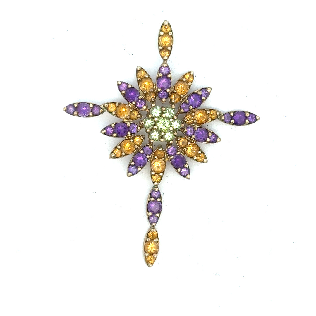 9ct yellow gold pendant weighing 4.6g, unbranded, displayed on a white background with detailed craftsmanship.