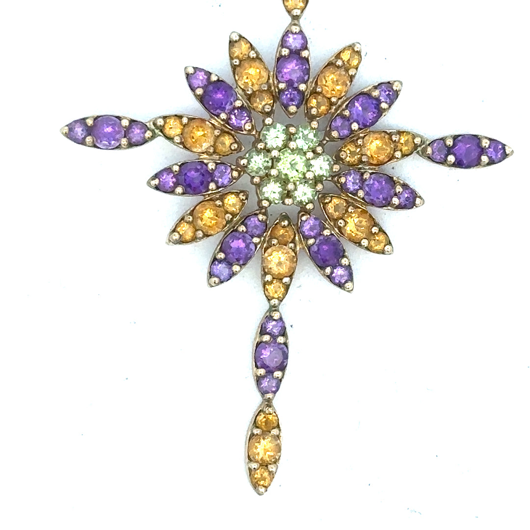 9ct yellow gold pendant weighing 4.6g, unbranded jewelry piece with detailed design, shown on a plain background.