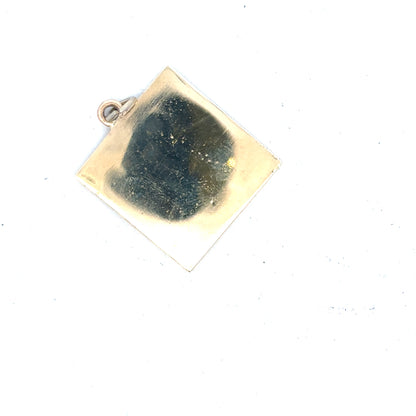 9ct yellow gold pendant weighing 9.6g, unbranded with a simple, elegant design, shown against a neutral background.