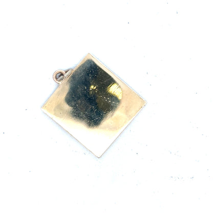 9ct yellow gold pendant weighing 9.6g, unbranded jewelry piece with a simple, elegant design, shown against a plain background.