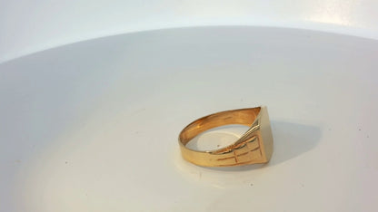 9ct yellow gold ring with a smooth band, unbranded, showcasing a classic and elegant design suitable for everyday wear.