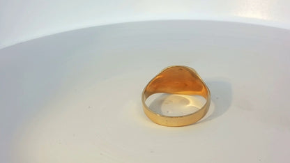 9ct yellow gold ring with a smooth band, unbranded, featuring a simple elegant design visible in the image.