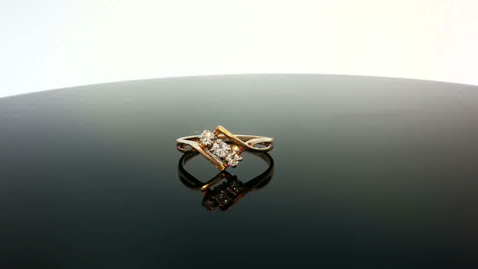 Yellow gold ring with a polished finish, unbranded 9 carat gold jewelry piece, visible smooth band design.