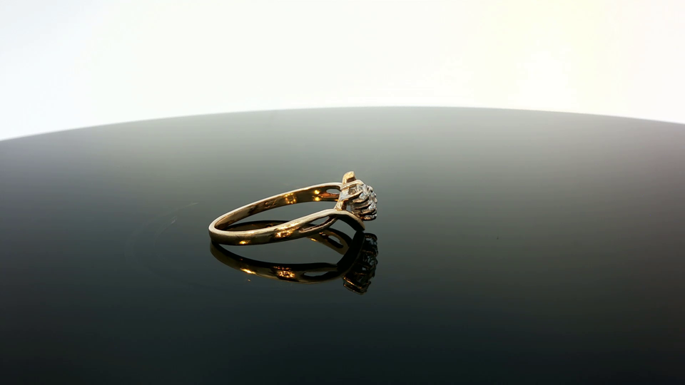9ct yellow gold ring with a smooth polished finish, showcasing a classic and elegant jewelry design.