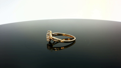 9ct yellow gold ring with a smooth polished finish, showcasing a simple and elegant design.